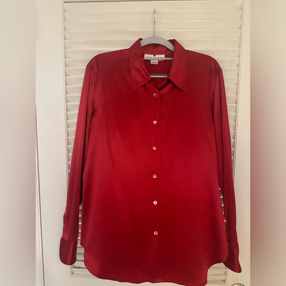 Perfect for the holidays! This red silk blouse from Saks is gorgeous.